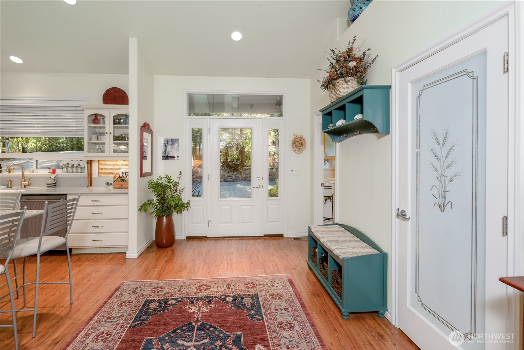 121 Buck Loop Road Sequim, WA 98382 - Photo 10 of 40 a view of an entryway with wooden floor and a potted plant