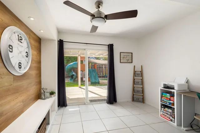 a view of an empty room and window