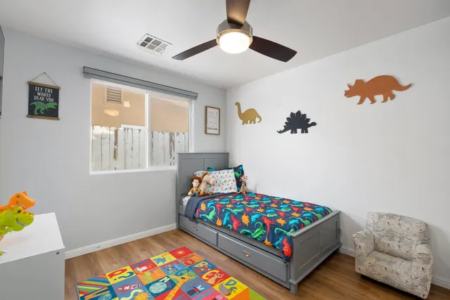 a kitchen with stainless steel appliances a refrigerator sink and cabinets