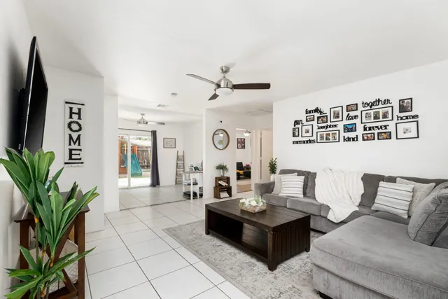 a kitchen with a sink a cabinets and window