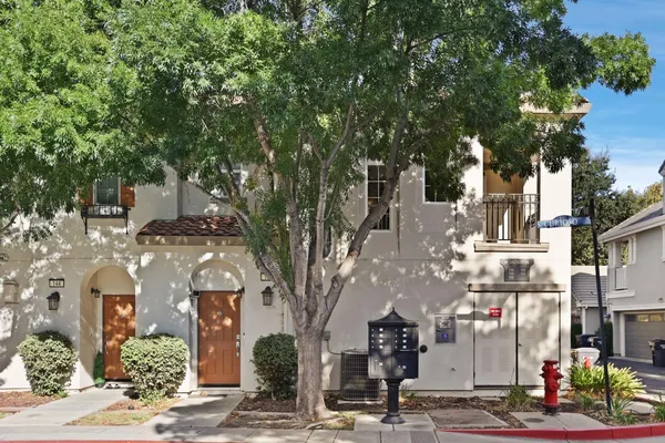 a front view of a building with street view