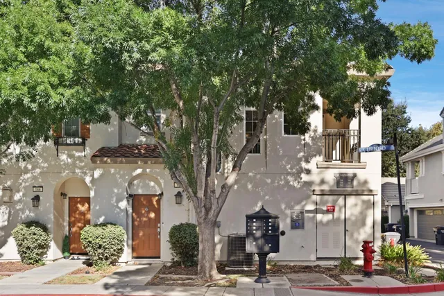 a front view of a building with street view