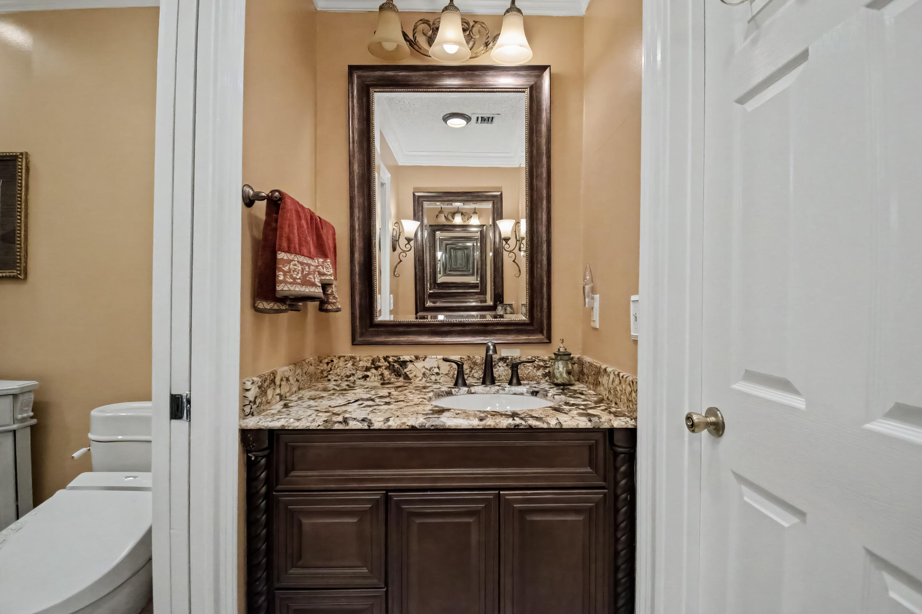 9708 Erica Court Boca Raton, FL 33496 - Photo 34 of 54 a bathroom with a sink and a mirror