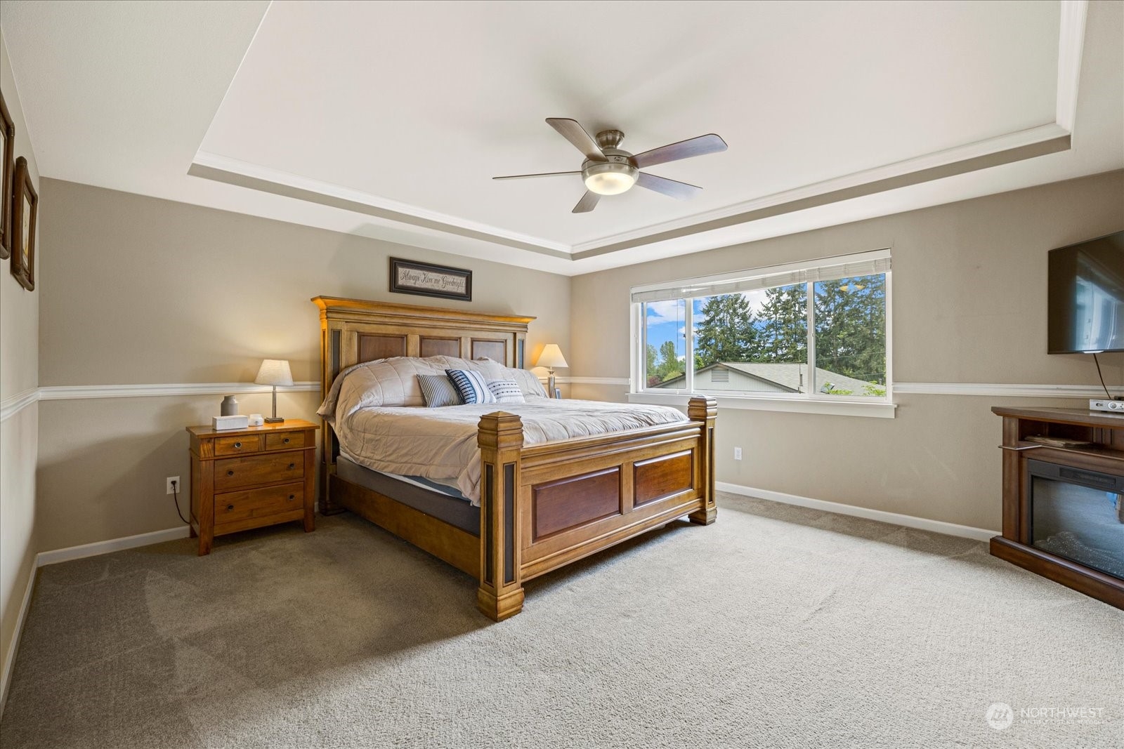 428 199th Place Southeast Bothell, WA 98012 - Photo 25 of 40 a bedroom with a bed and a ceiling fan