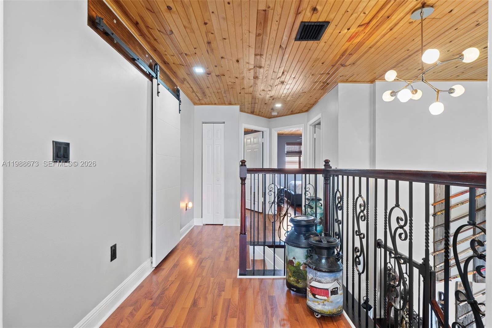 14888 Southwest 140th Street Miami, FL 33196 - Photo 11 of 76 a view of entryway with wooden floor