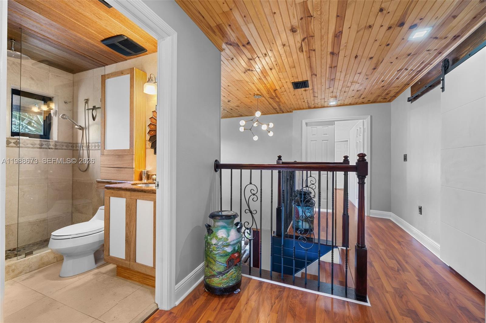 14888 Southwest 140th Street Miami, FL 33196 - Photo 12 of 76 a view of a hallway and wooden floor