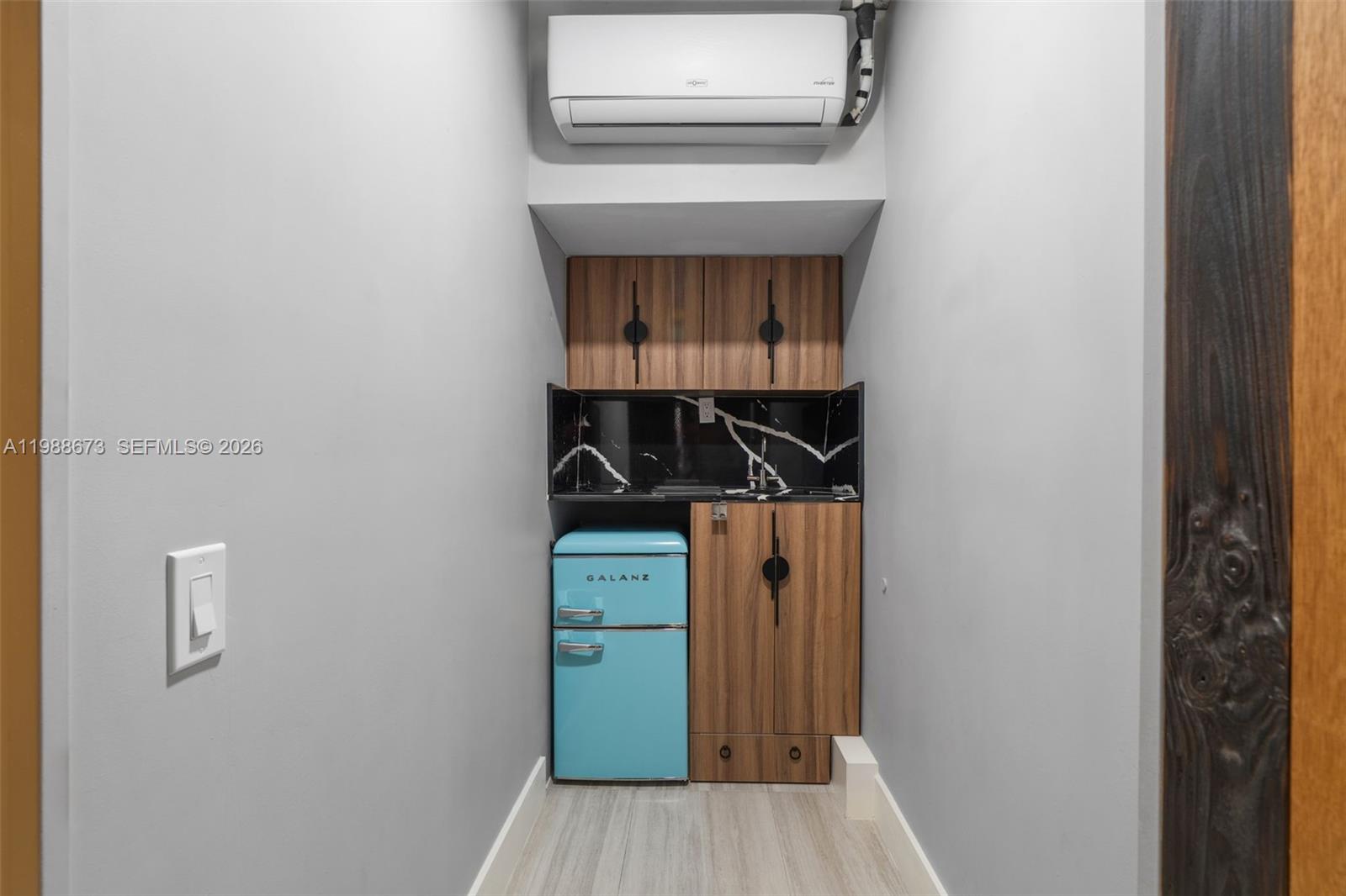 14888 Southwest 140th Street Miami, FL 33196 - Photo 37 of 76 a view of storage and utility room