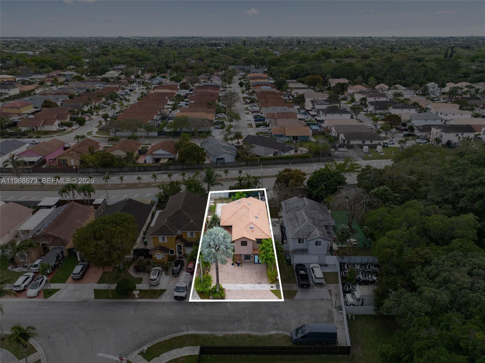 14888 Southwest 140th Street Miami, FL 33196 - Photo 52 of 76 an aerial view of house with a yard