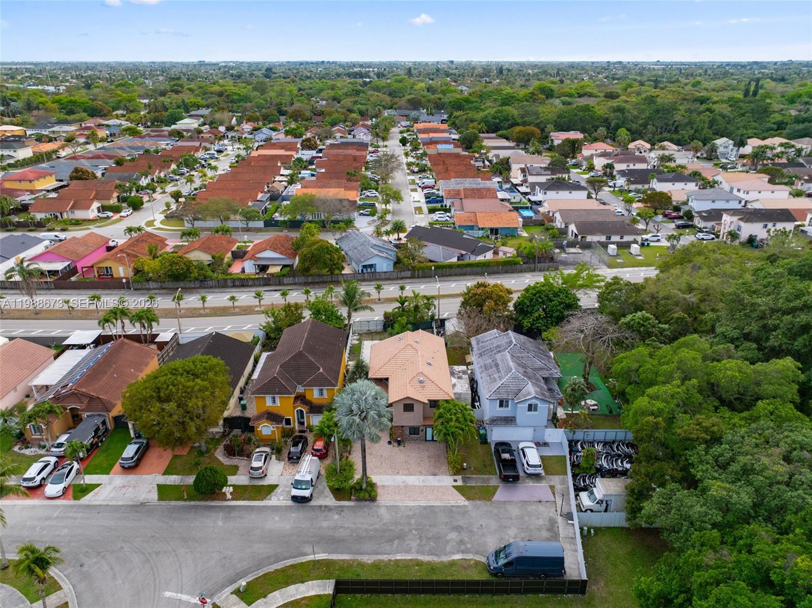14888 Southwest 140th Street Miami, FL 33196 - Photo 53 of 76 an aerial view of house with yard swimming pool and ocean view