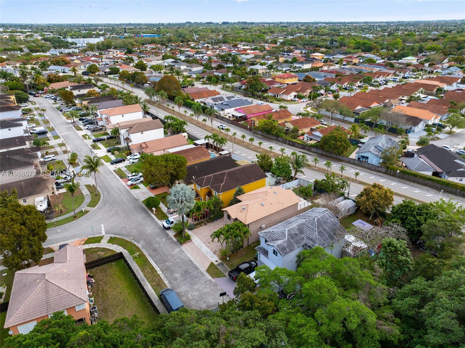 14888 Southwest 140th Street Miami, FL 33196 - Photo 55 of 76 an aerial view of residential houses with outdoor space