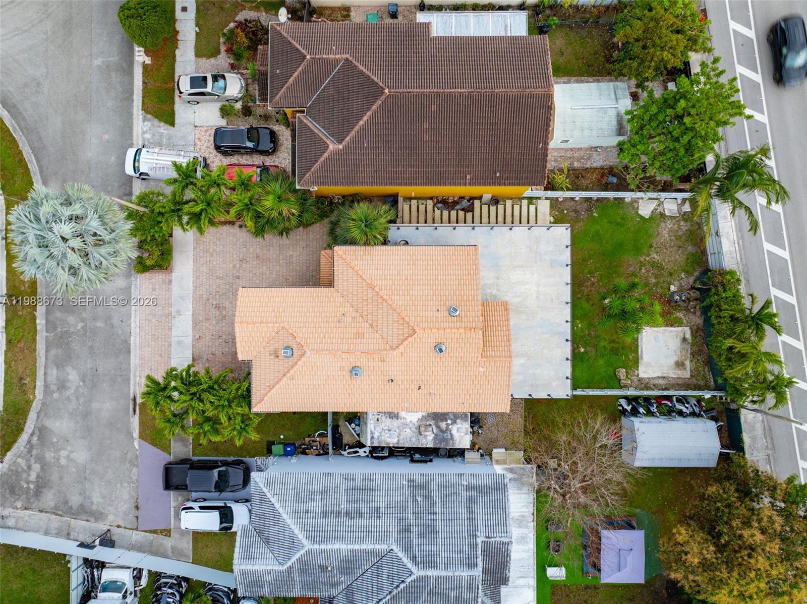 14888 Southwest 140th Street Miami, FL 33196 - Photo 57 of 76 an aerial view of a house with swimming pool and garden