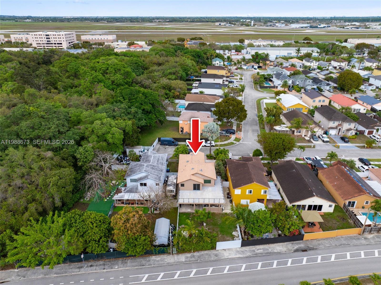 14888 Southwest 140th Street Miami, FL 33196 - Photo 58 of 76 an aerial view of residential building and lake