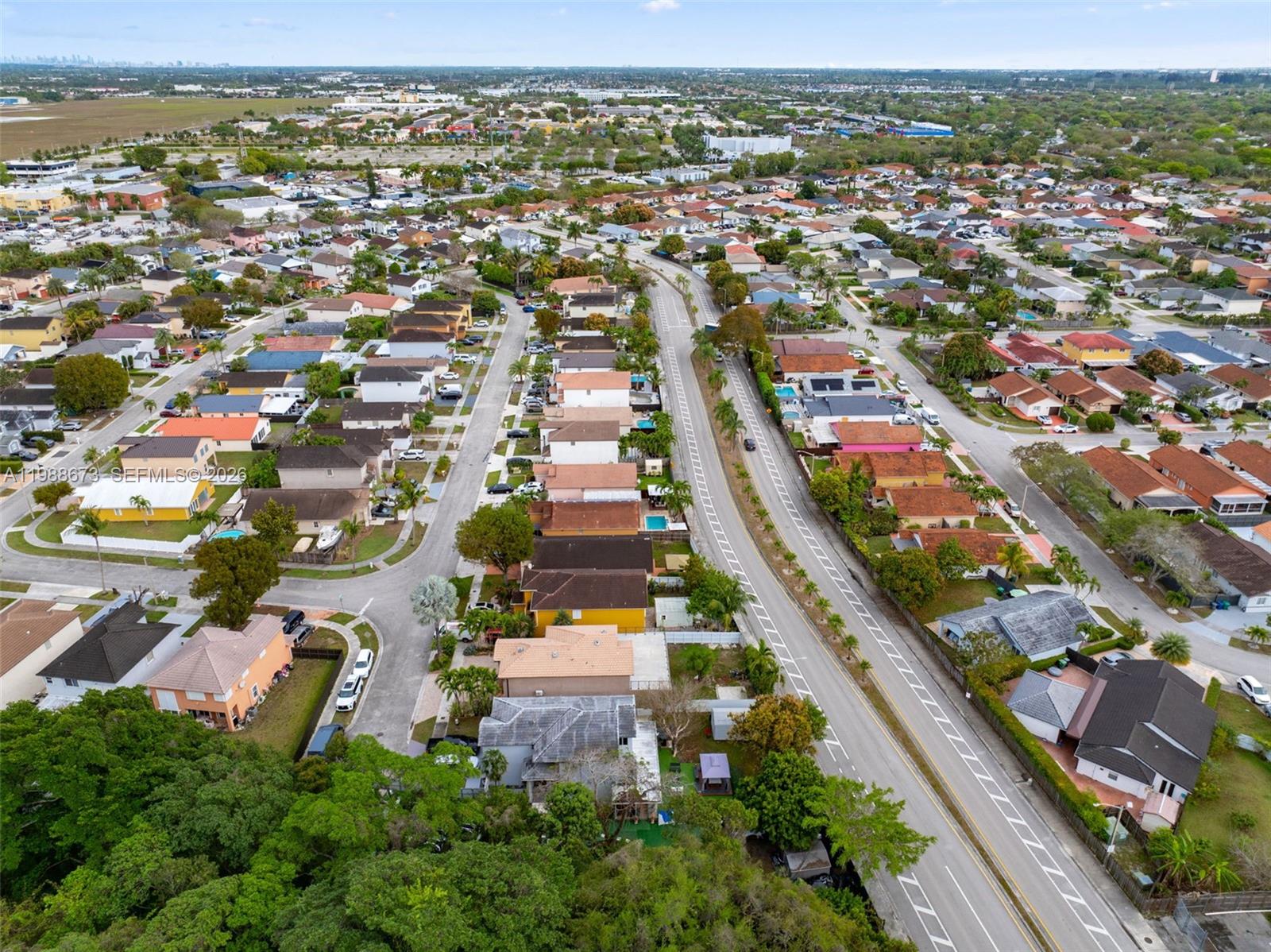 14888 Southwest 140th Street Miami, FL 33196 - Photo 69 of 76 an aerial view of residential houses with outdoor space