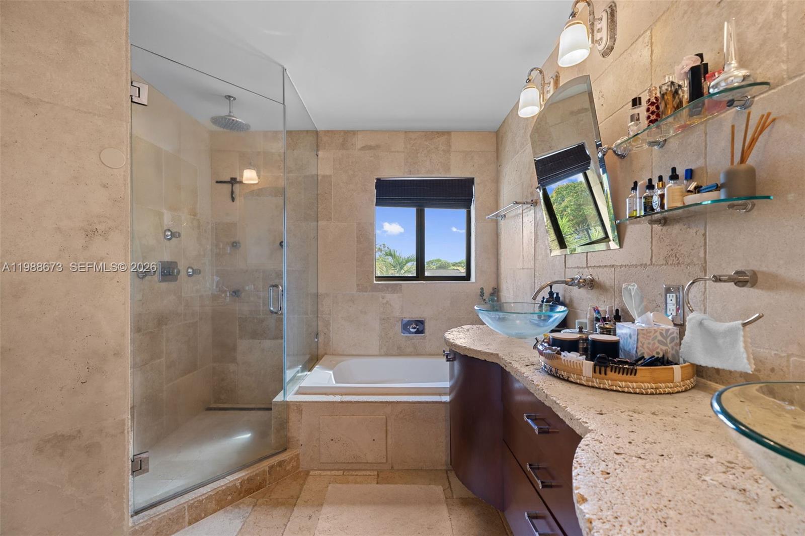 14888 Southwest 140th Street Miami, FL 33196 - Photo 9 of 76 a bathroom with a tub sink mirror and toilet