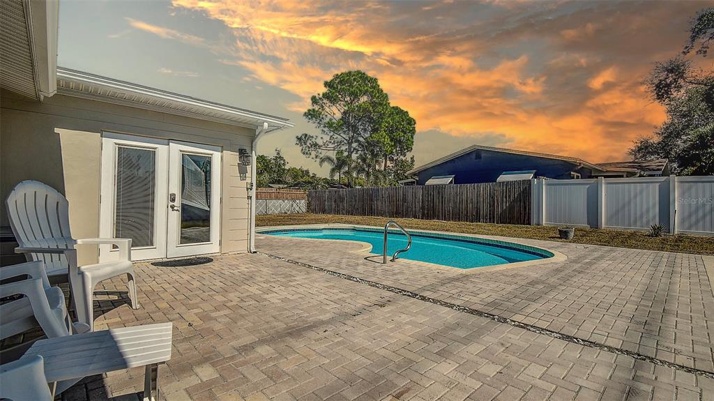8601 139th Street Seminole, FL 33776 - Photo 16 of 47 a view of a backyard with a small cabin