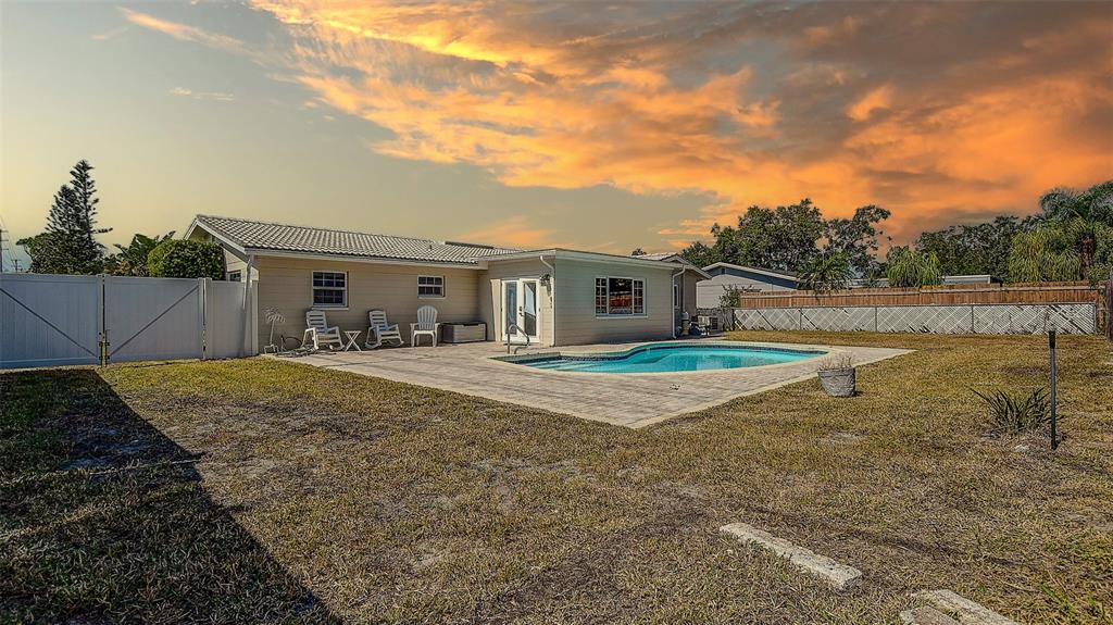 8601 139th Street Seminole, FL 33776 - Photo 18 of 47 a view of outdoor space yard and swimming pool