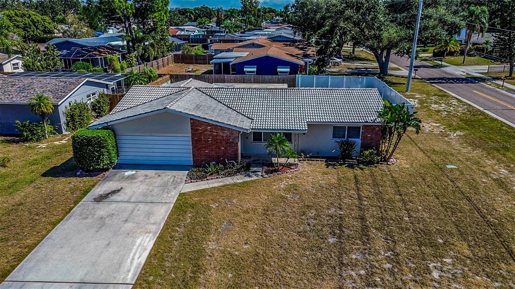 8601 139th Street Seminole, FL 33776 - Photo 2 of 47 a view of house with outdoor space