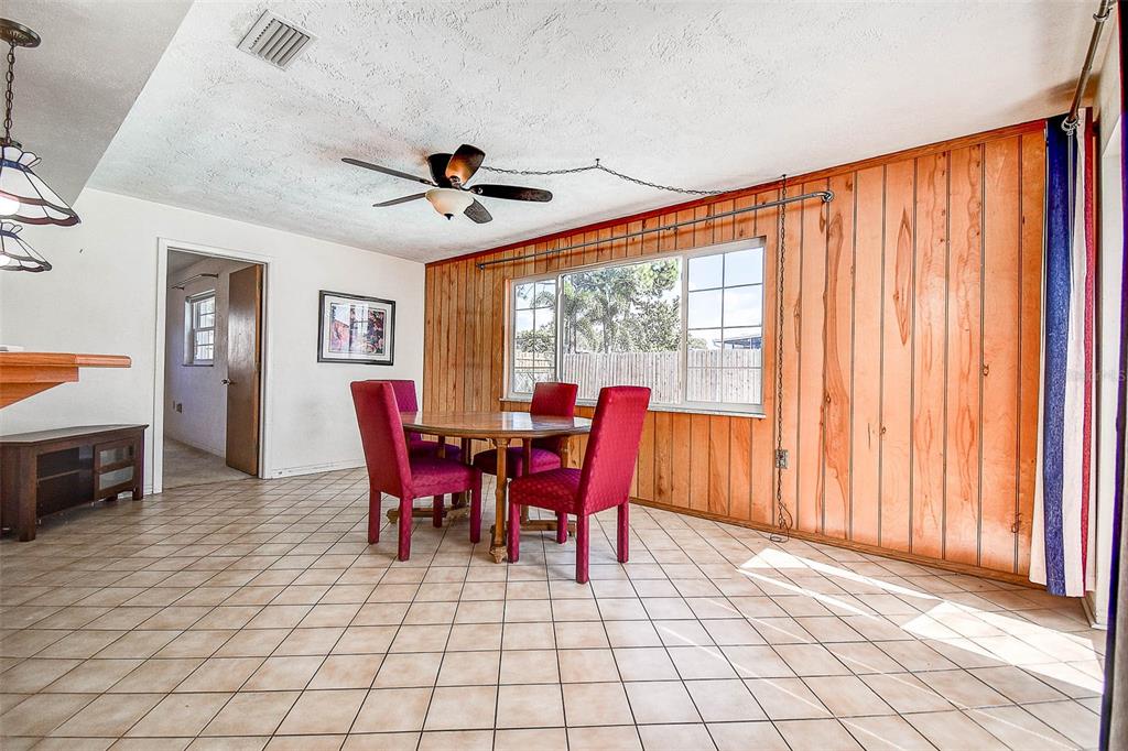 8601 139th Street Seminole, FL 33776 - Photo 33 of 47 a view of a dining room with furniture window and outside view