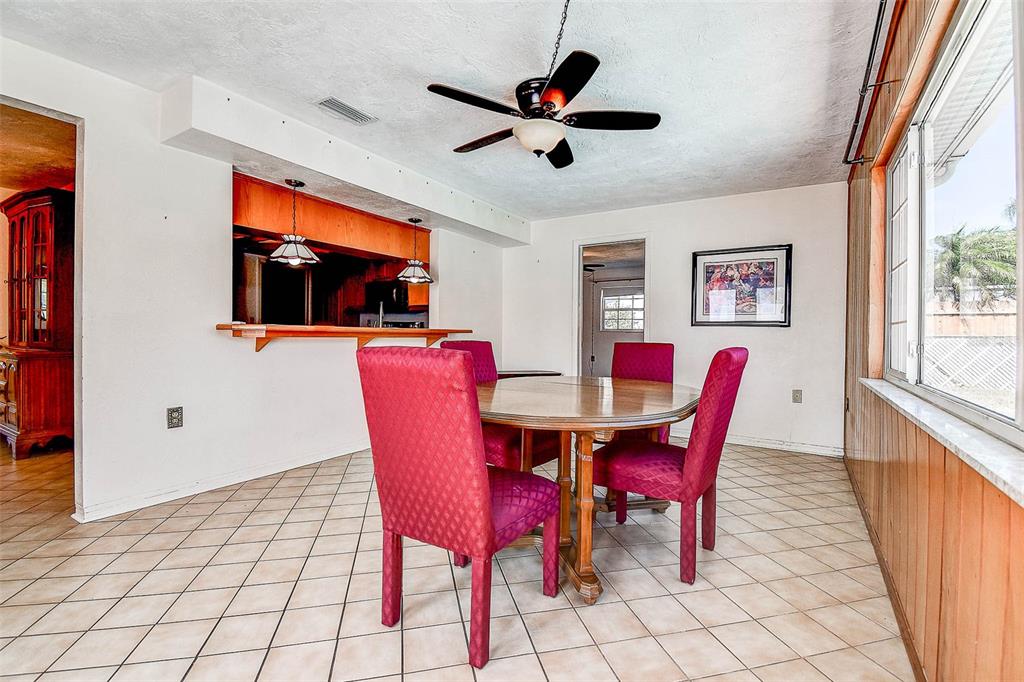 8601 139th Street Seminole, FL 33776 - Photo 34 of 47 a view of a dining room with furniture