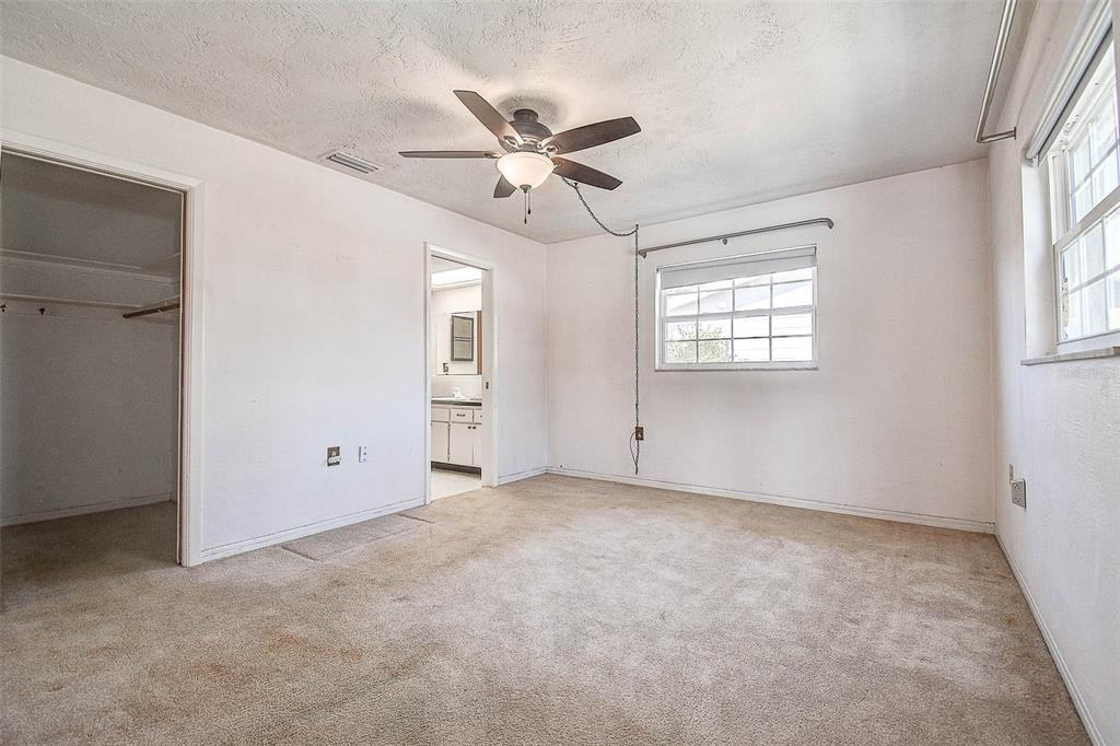 8601 139th Street Seminole, FL 33776 - Photo 36 of 47 a view of an empty room with a window