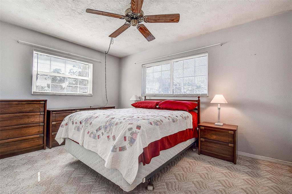 8601 139th Street Seminole, FL 33776 - Photo 44 of 47 a bedroom with a bed and a window