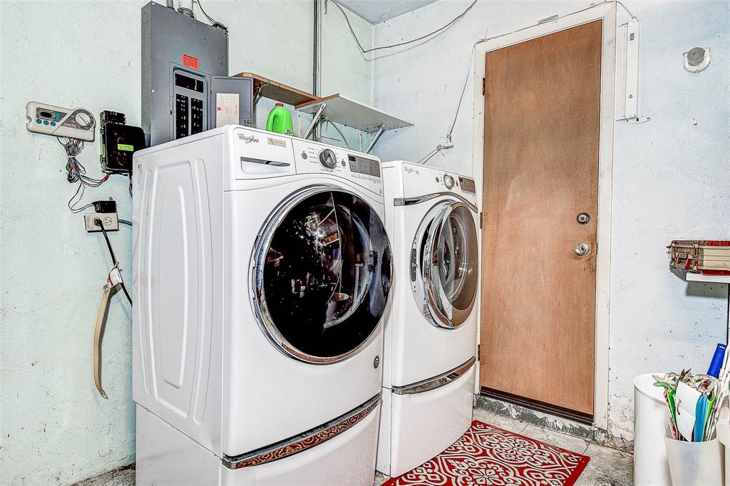 8601 139th Street Seminole, FL 33776 - Photo 46 of 47 a utility room with dryer and washer