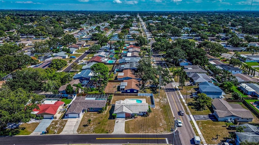 8601 139th Street Seminole, FL 33776 - Photo 5 of 47 an aerial view of residential houses with outdoor space