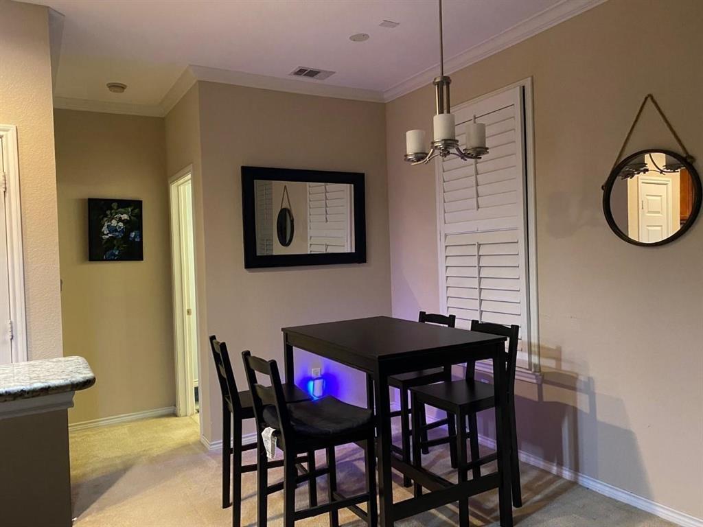 2018 Azure Pointe Richardson, TX 75080 - Photo 7 of 8 a view of a dining room with furniture