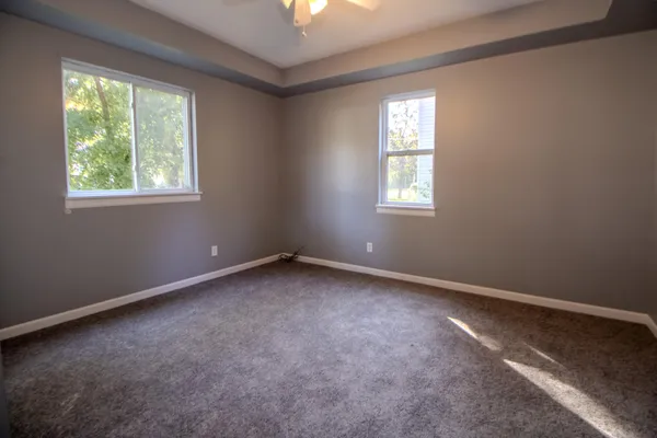 an empty room with windows