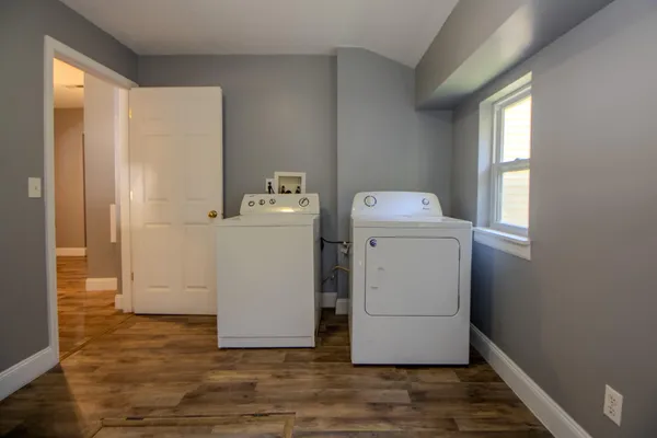 a utility room with dryer and washer