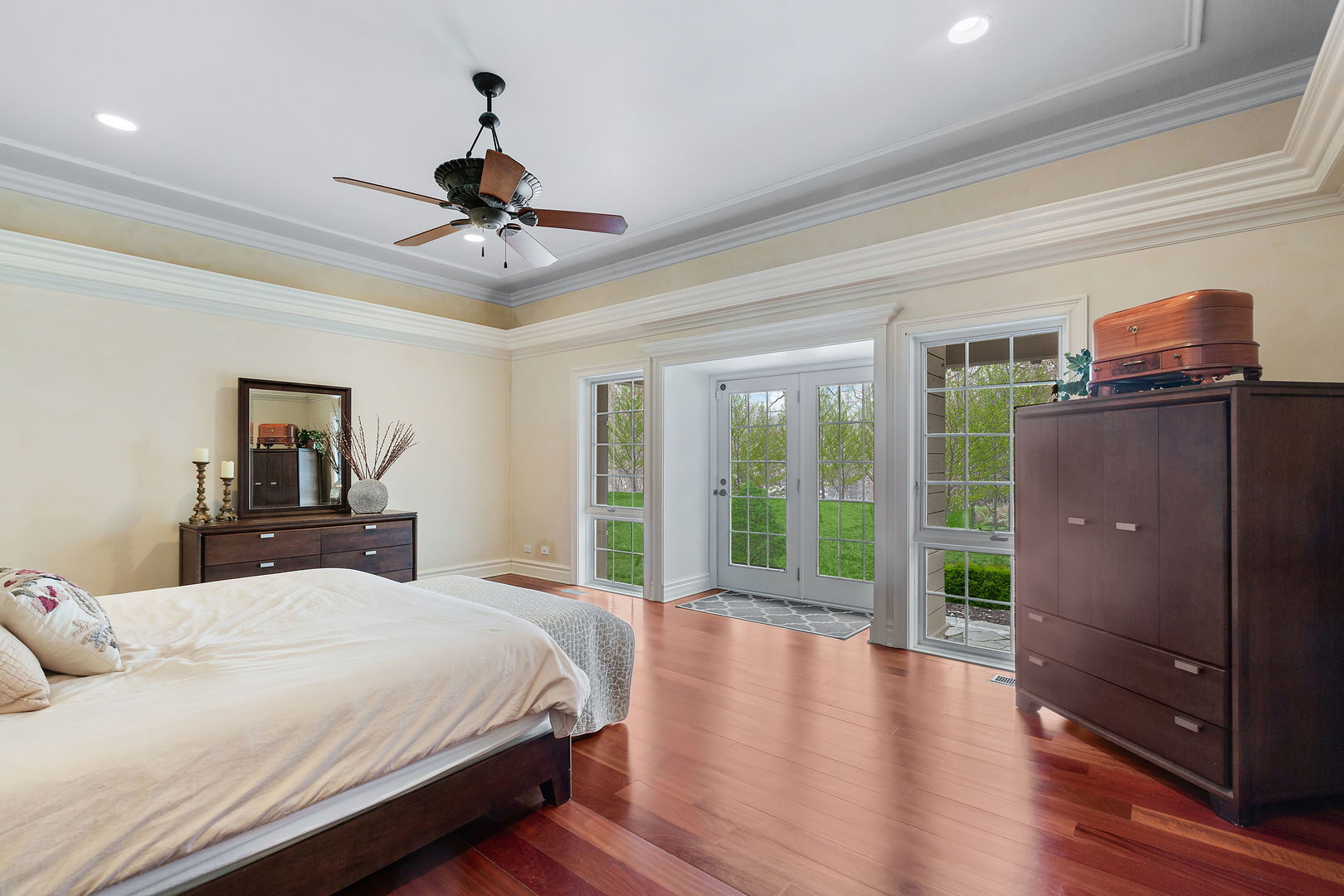 1560 South Ridge Road Lake Forest, IL 60045 - Photo 14 of 27 a bedroom with a large bed and a large window