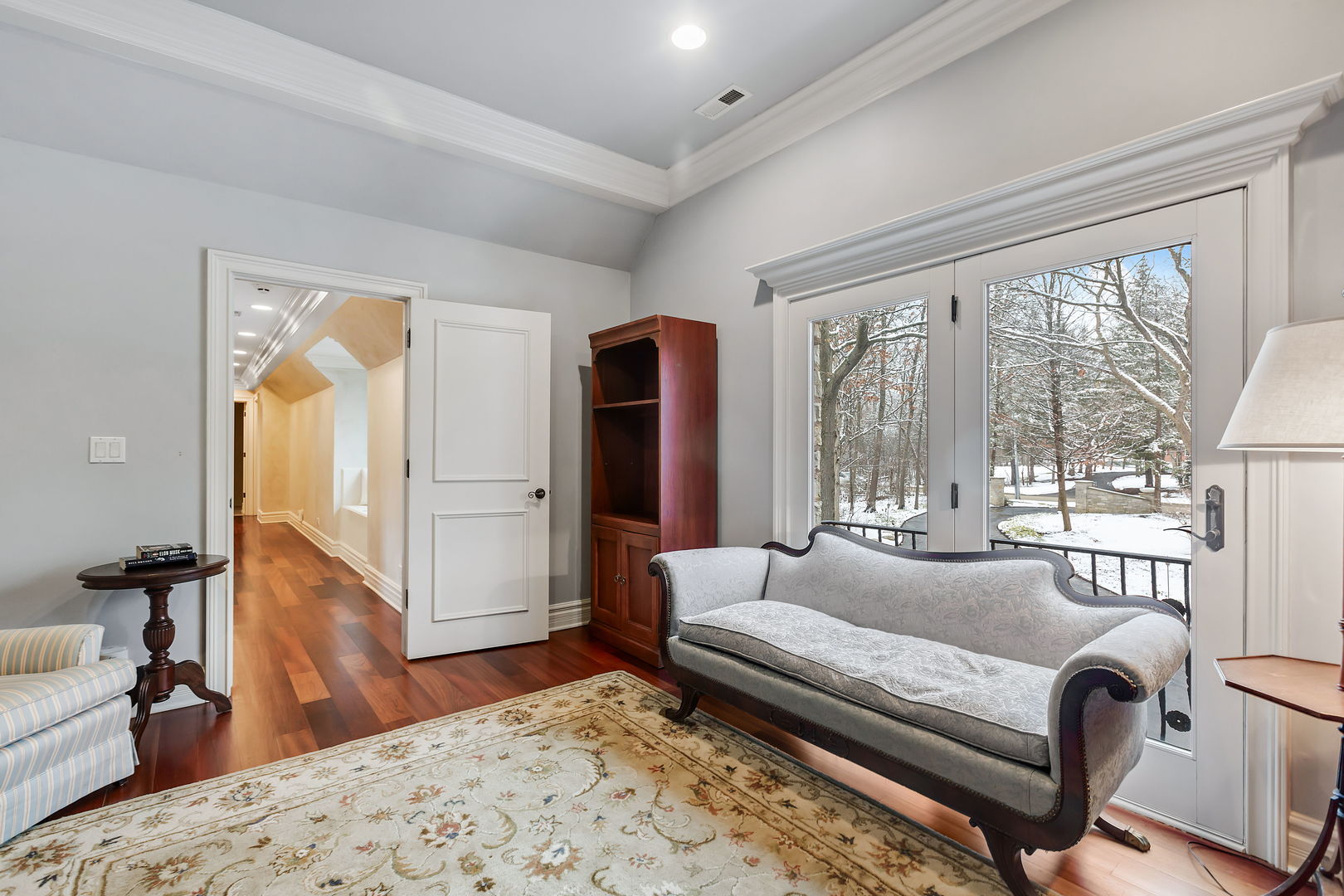 1560 South Ridge Road Lake Forest, IL 60045 - Photo 16 of 27 a bedroom with a large bed and a large window