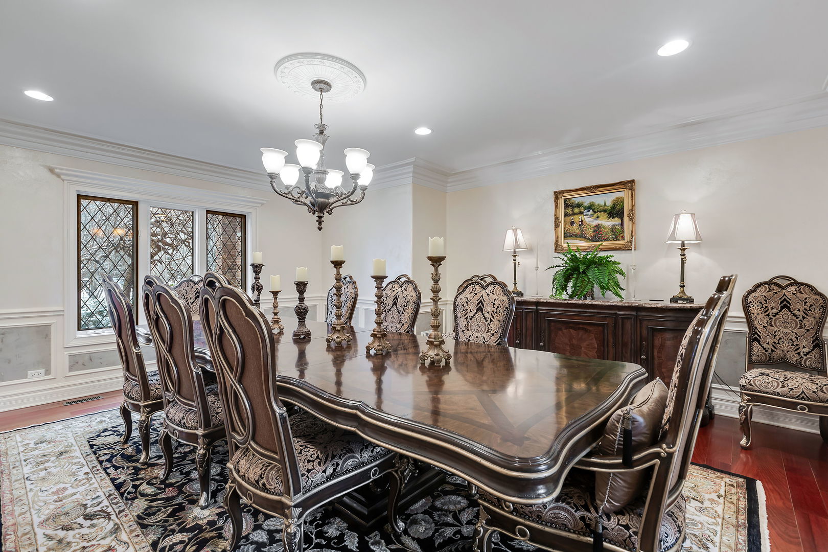 1560 South Ridge Road Lake Forest, IL 60045 - Photo 9 of 27 a dining room with furniture and chandelier