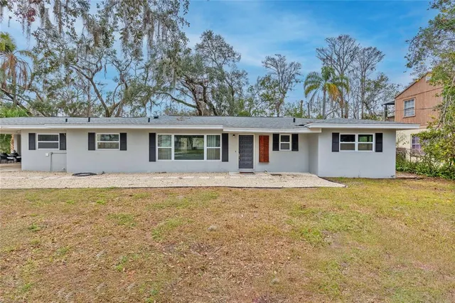 a view of a house with swimming pool