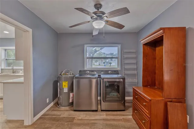 a kitchen with stainless steel appliances granite countertop a stove and a refrigerator