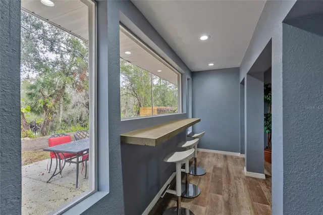 a workspace with furniture and a window