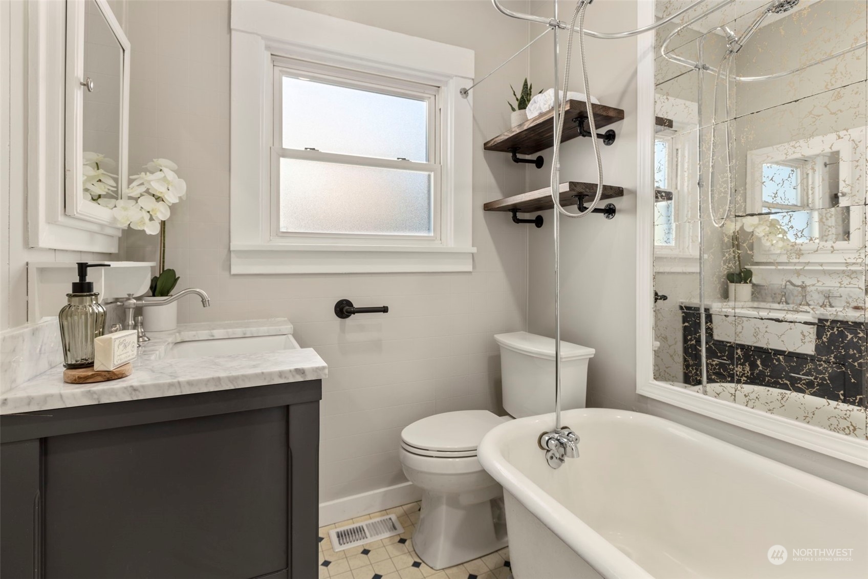1702 Griffin Avenue Enumclaw, WA 98022 - Photo 18 of 27 a bathroom with a sink a toilet and shower