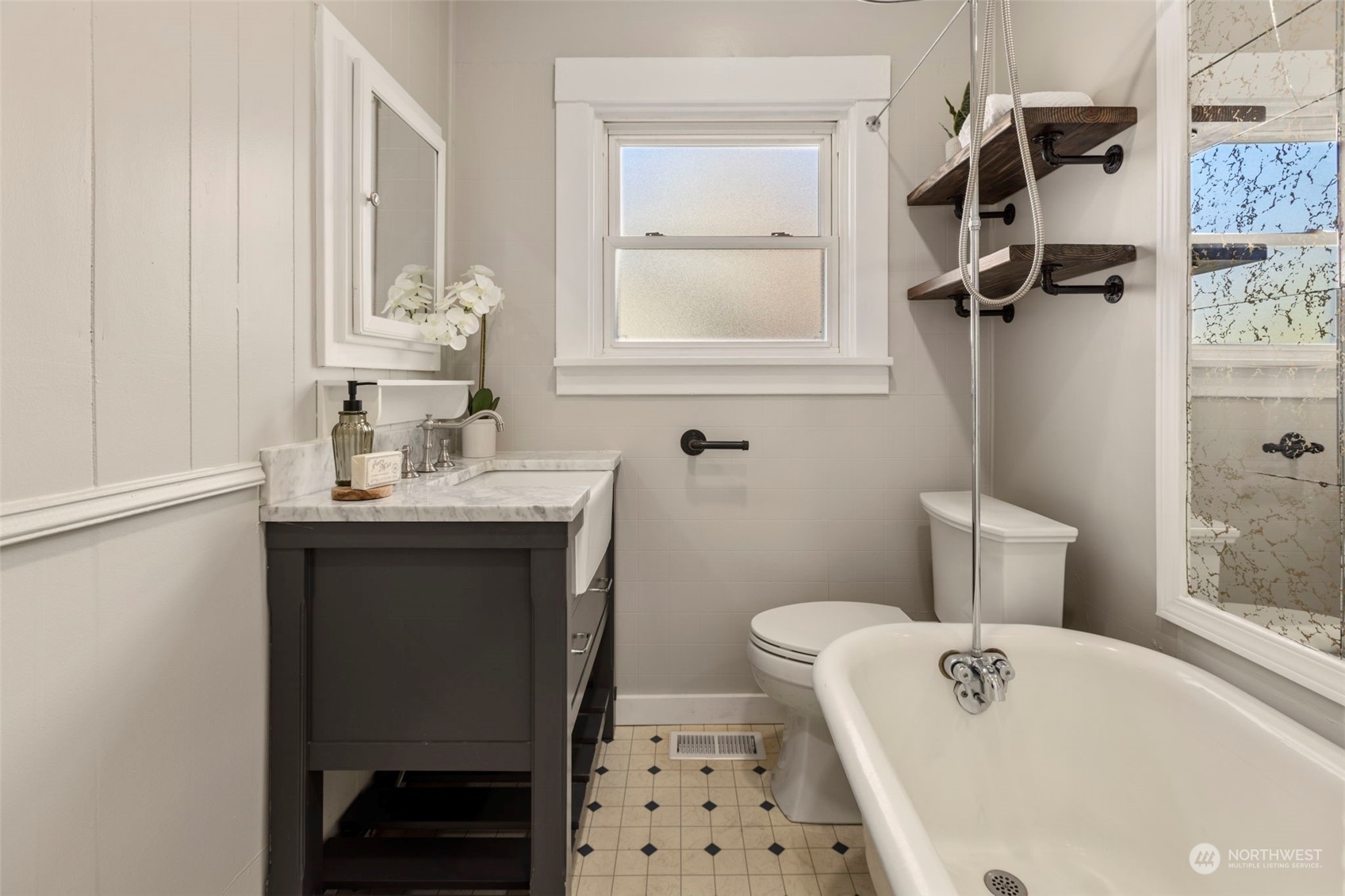 1702 Griffin Avenue Enumclaw, WA 98022 - Photo 19 of 27 a bathroom with a sink toilet and shower