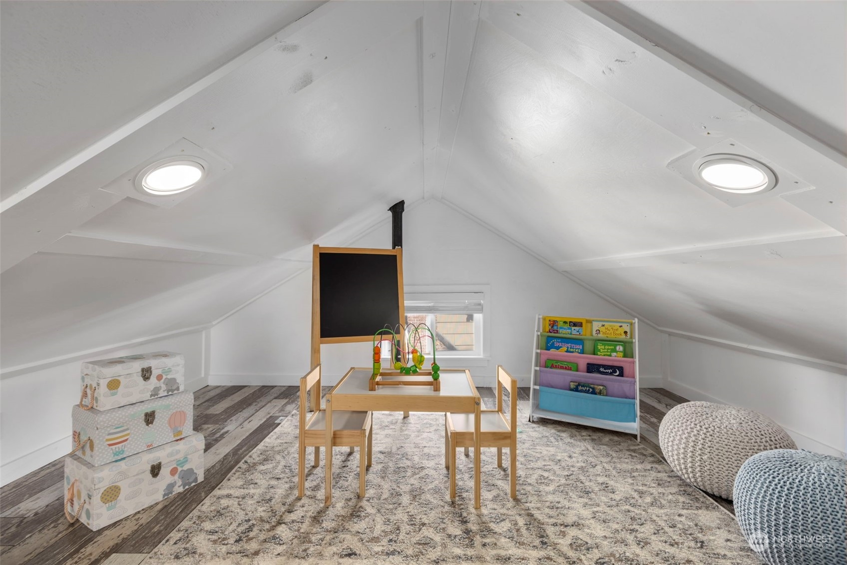 1702 Griffin Avenue Enumclaw, WA 98022 - Photo 20 of 27 a living room with furniture and a flat screen tv