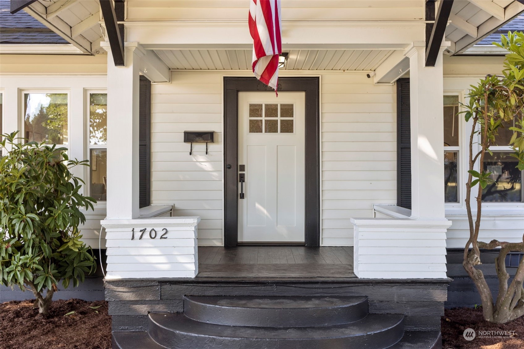 1702 Griffin Avenue Enumclaw, WA 98022 - Photo 5 of 27 a front view of a house with a yard