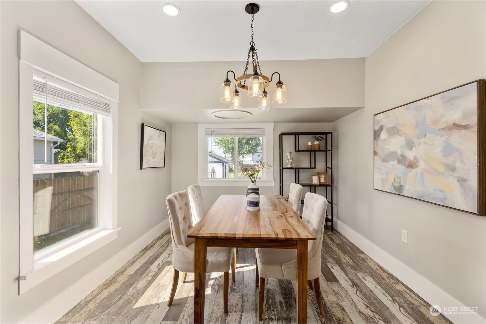 1702 Griffin Avenue Enumclaw, WA 98022 - Photo 9 of 27 a view of a dining room with furniture window and wooden floor