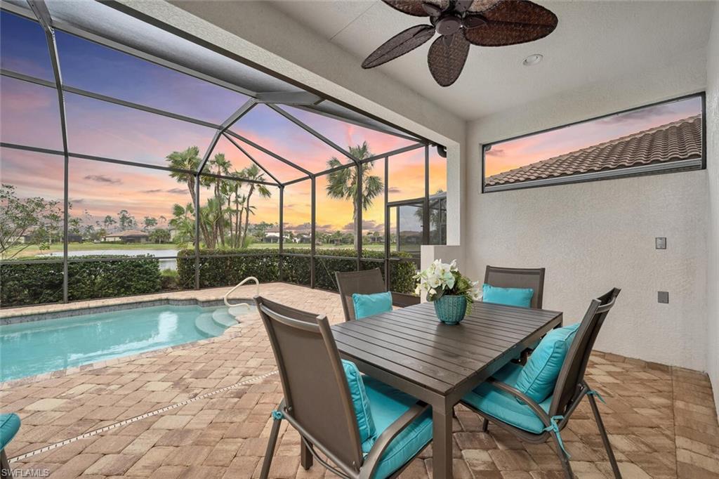 4741 Formosa Drive Naples, FL 34119 - Photo 13 of 18 a view of an outdoor dining space with a table and chairs
