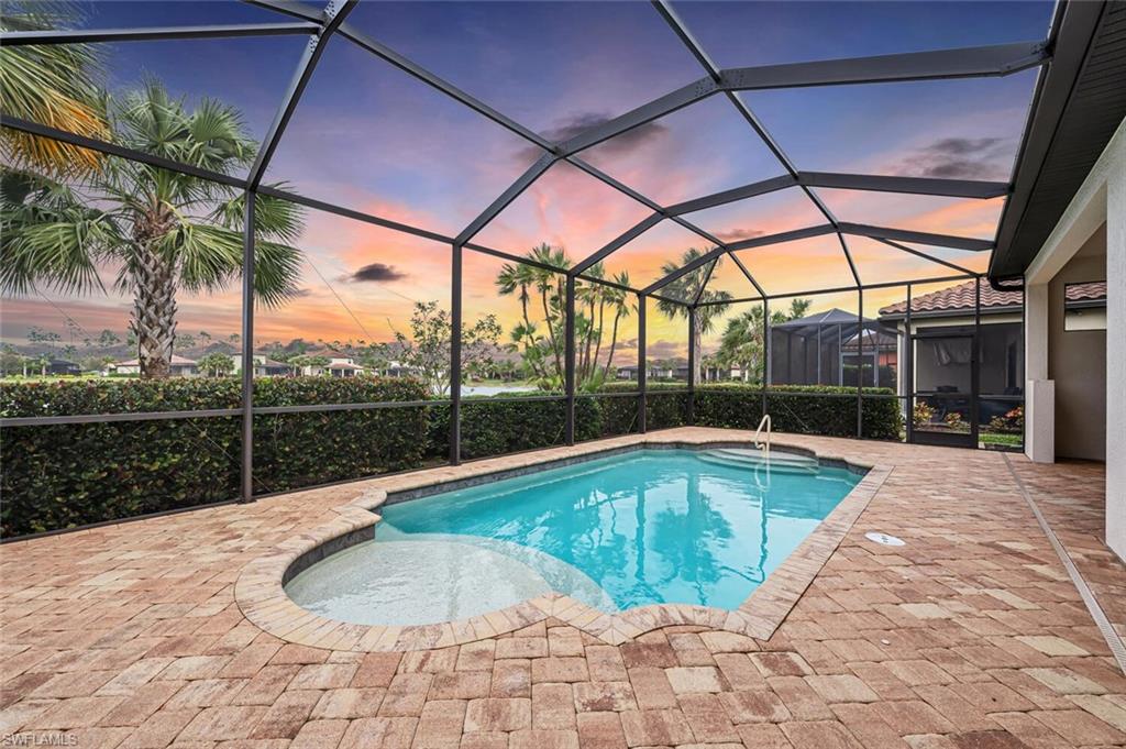 4741 Formosa Drive Naples, FL 34119 - Photo 14 of 18 a view of swimming pool with a patio