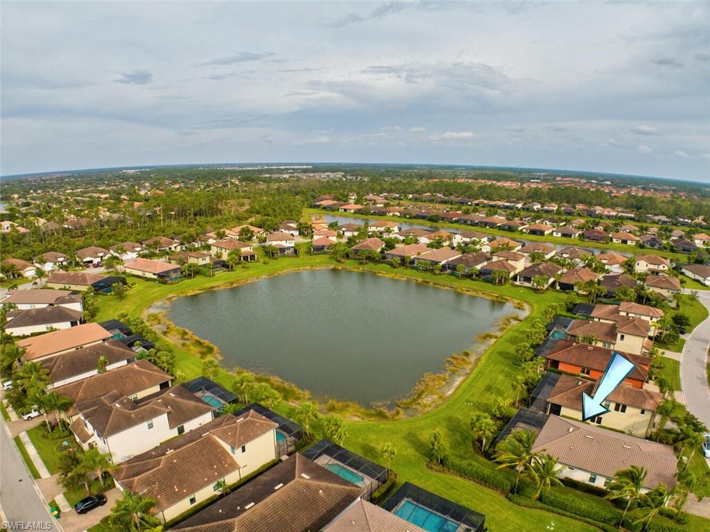 4741 Formosa Drive Naples, FL 34119 - Photo 3 of 18 an aerial view of a houses with a lake view