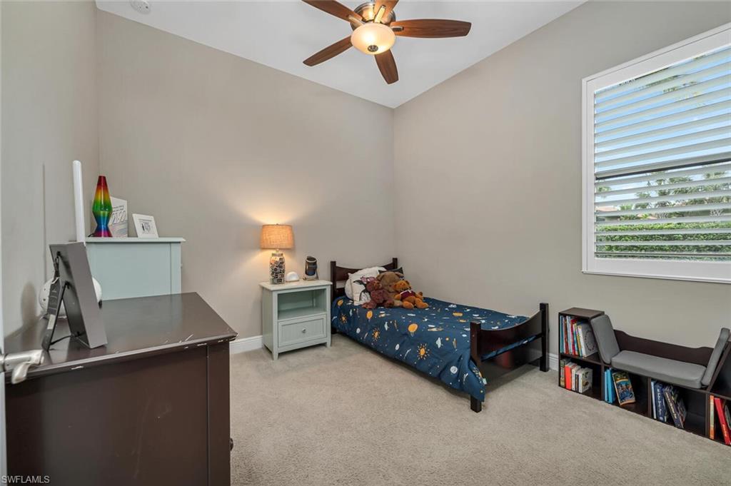 4741 Formosa Drive Naples, FL 34119 - Photo 6 of 18 a living room with furniture and a window