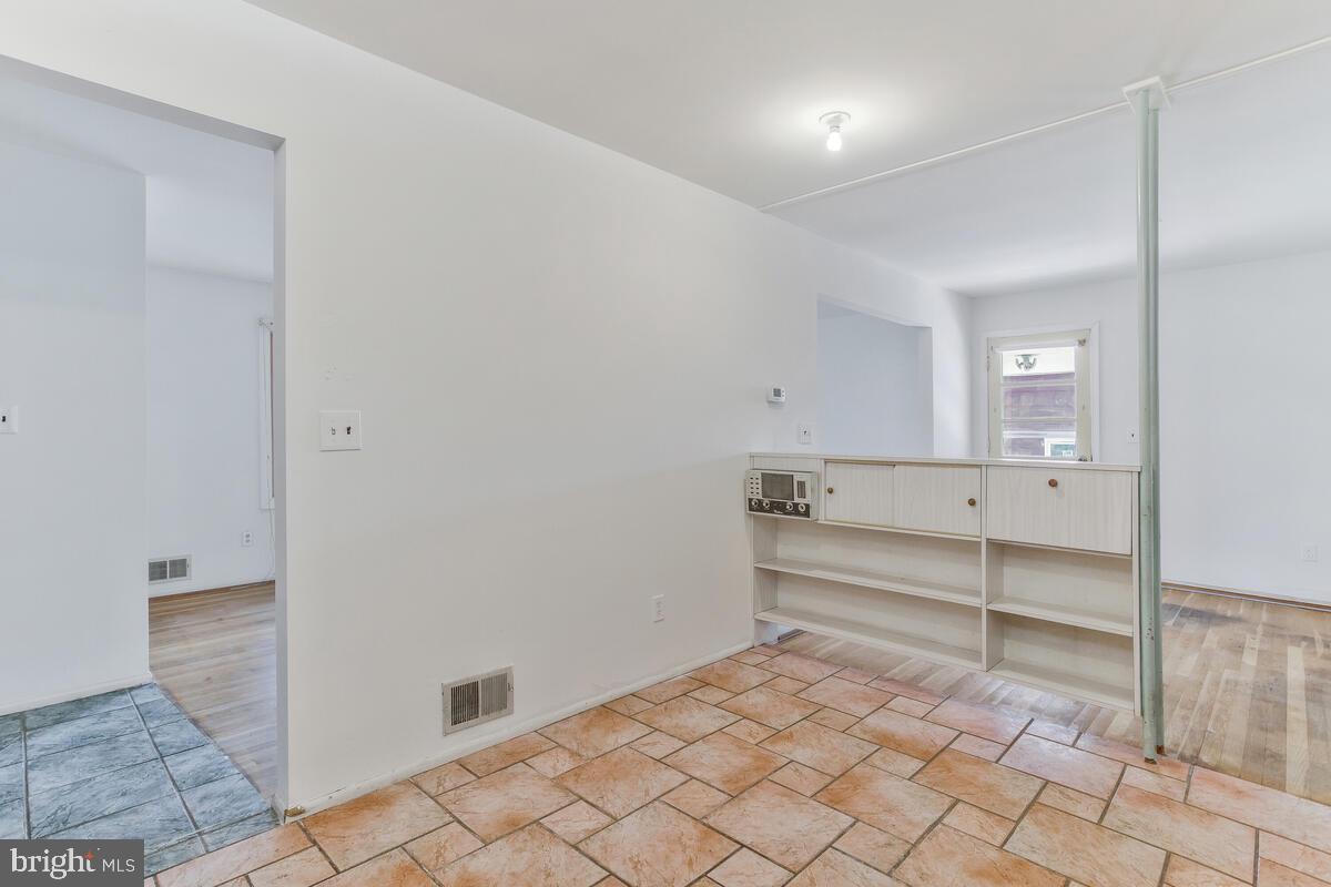 12412 Palermo Drive Silver Spring, MD 20904 - Photo 16 of 43 a room with a furniture and a window