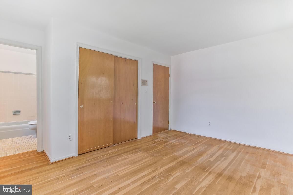 12412 Palermo Drive Silver Spring, MD 20904 - Photo 20 of 43 a view of empty room with wooden floor