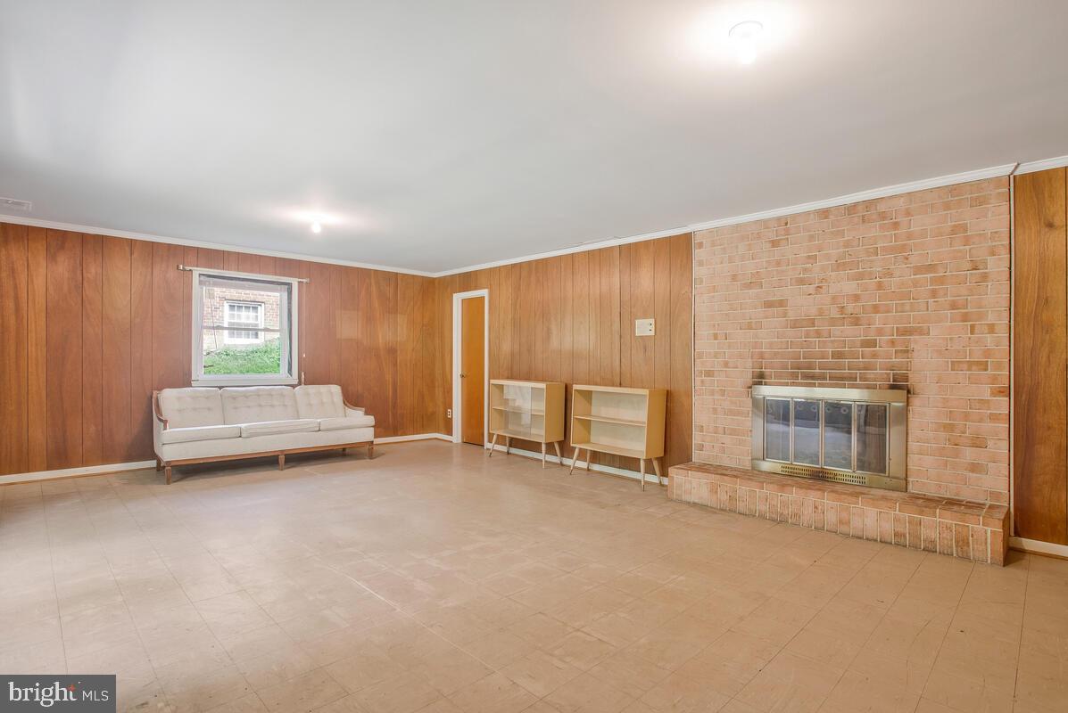 12412 Palermo Drive Silver Spring, MD 20904 - Photo 28 of 43 a view of livingroom with furniture and fireplace