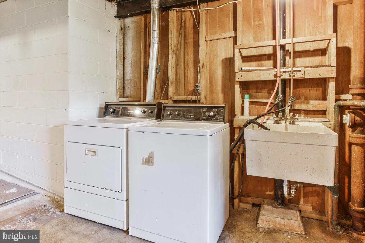 12412 Palermo Drive Silver Spring, MD 20904 - Photo 36 of 43 a utility room with dryer and washer