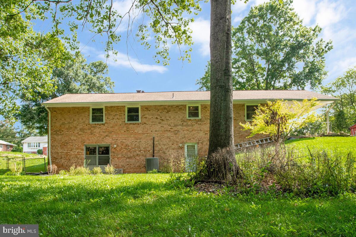 12412 Palermo Drive Silver Spring, MD 20904 - Photo 37 of 43 a front view of a house with a yard